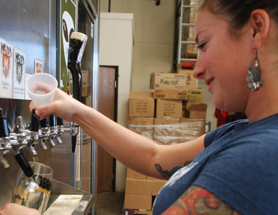 Pouring Mike Hess Beer